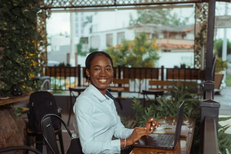 Business owner reviewing numbers on a laptop
