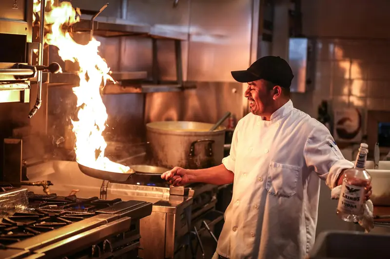 Chef cooking in a restaurant kitchen