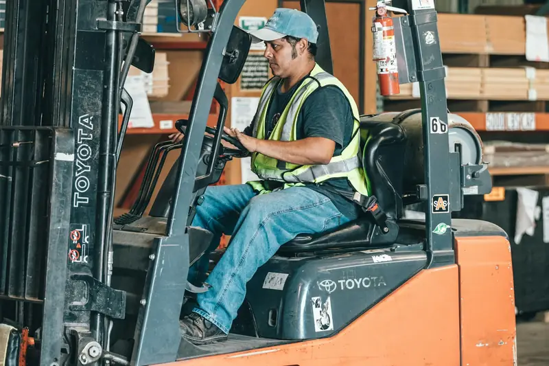 Forklift moving stock in a warehouse